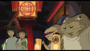 Chihiro and Lin looking surprised by frog-like spirits carrying lanterns at night in the world of Spirited Away.